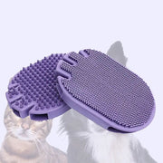 Massaging pet shampoo brush in purple color, featuring soft bristles for comfortable pet grooming and bathing.