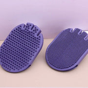 Massaging pet shampoo brush in purple color, designed for grooming and bathing pets.
