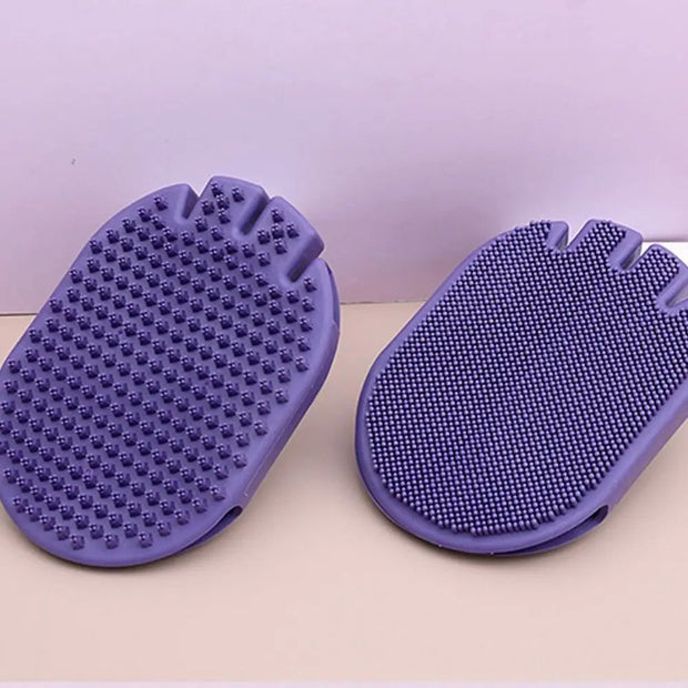 Massaging pet shampoo brush in purple color, designed for grooming and bathing pets.